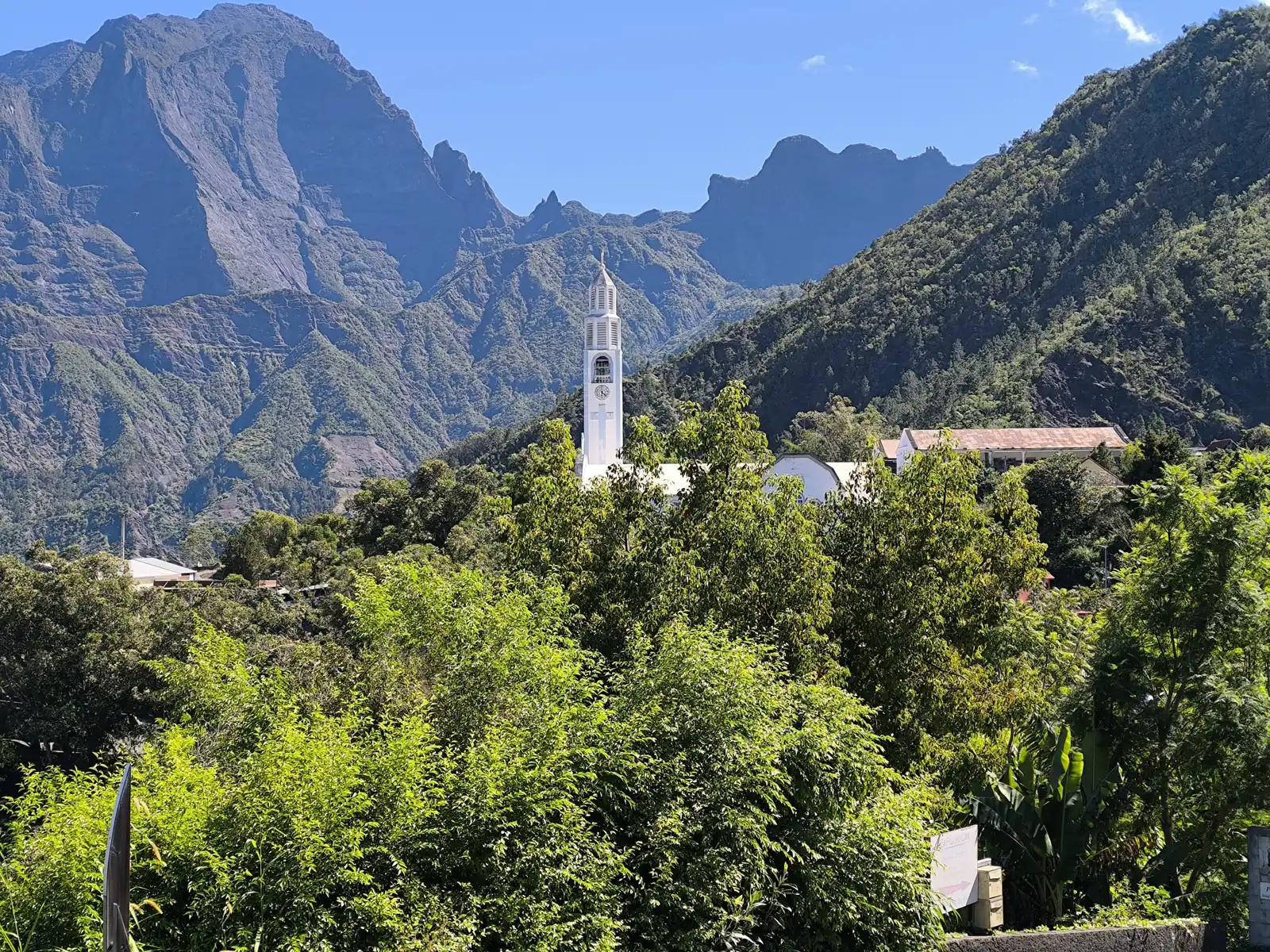 The Cirque de Cilaos with the church of Notre-Dame des Neiges standing in the town below the cirque walls