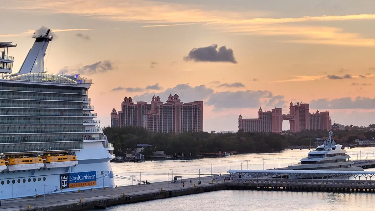 Bahamian junkanoo dancers in colorful costumes performing at beach club