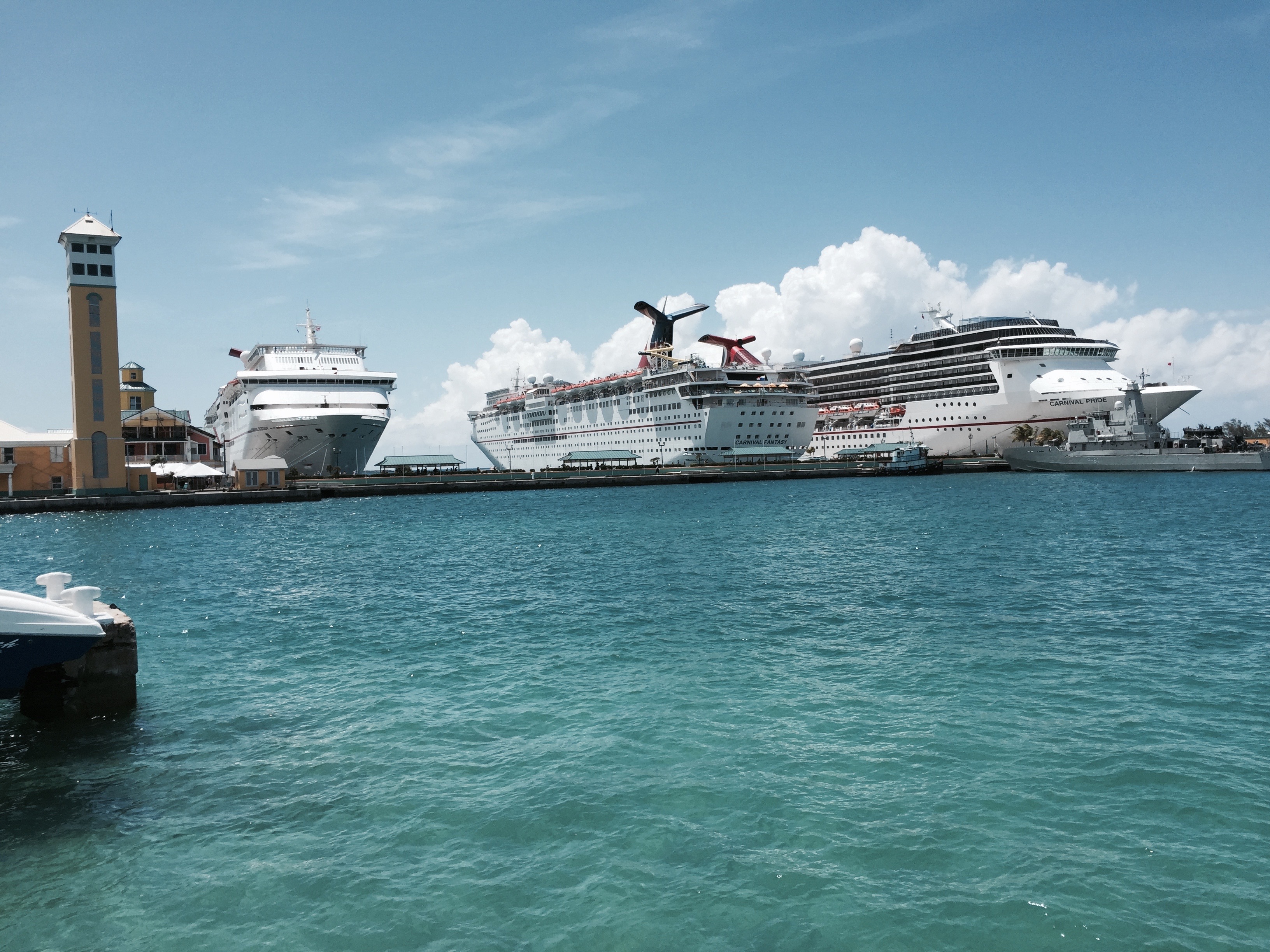 Royal Caribbean ferry boat approaching beach club dock with passengers