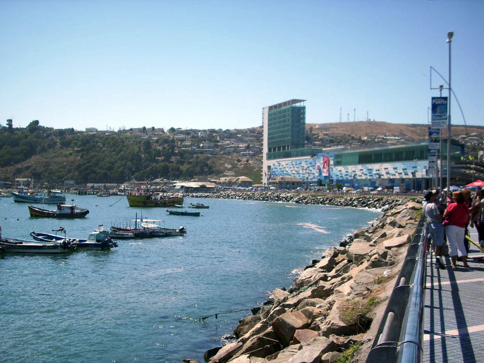 The Paseo Bellamar promenade at San Antonio running above the rocky shore