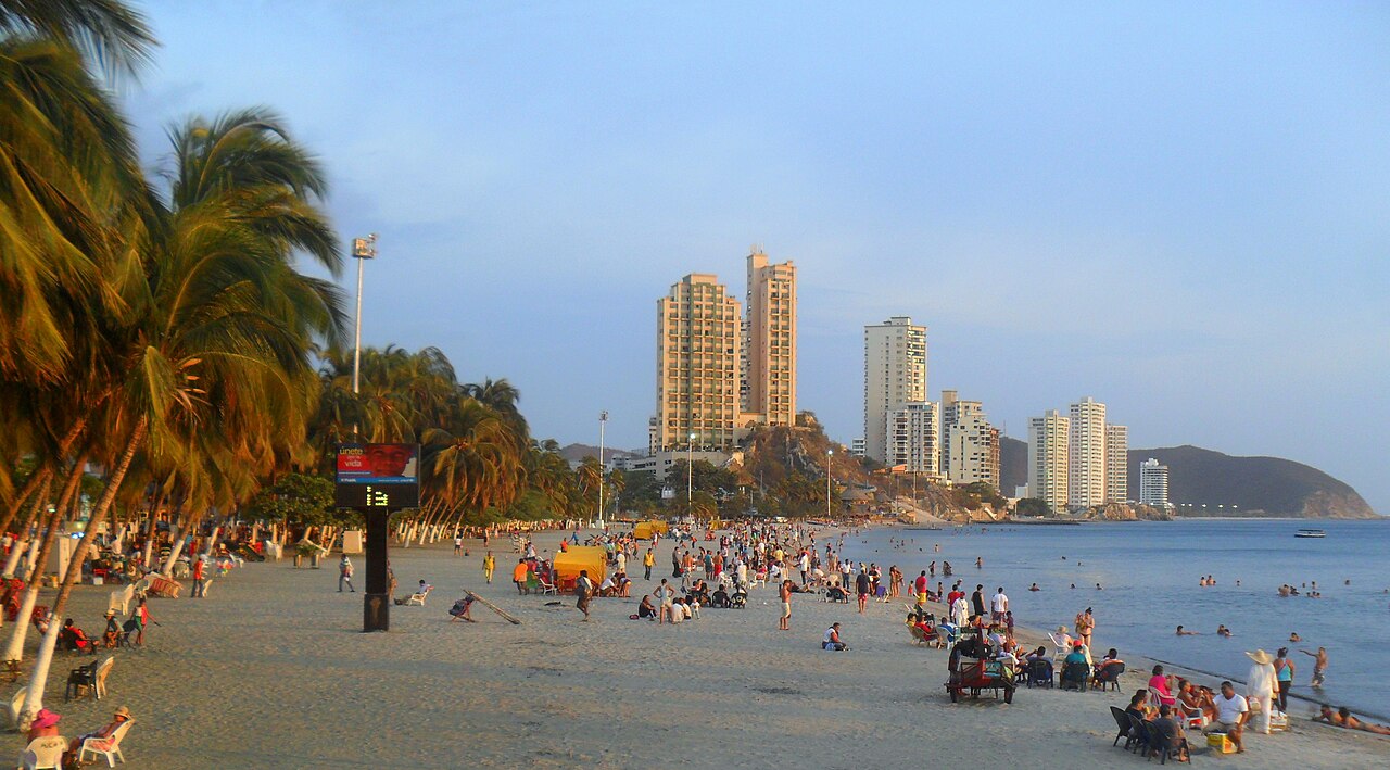 El Rodadero beach in Santa Marta with palm trees and high-rise buildings
