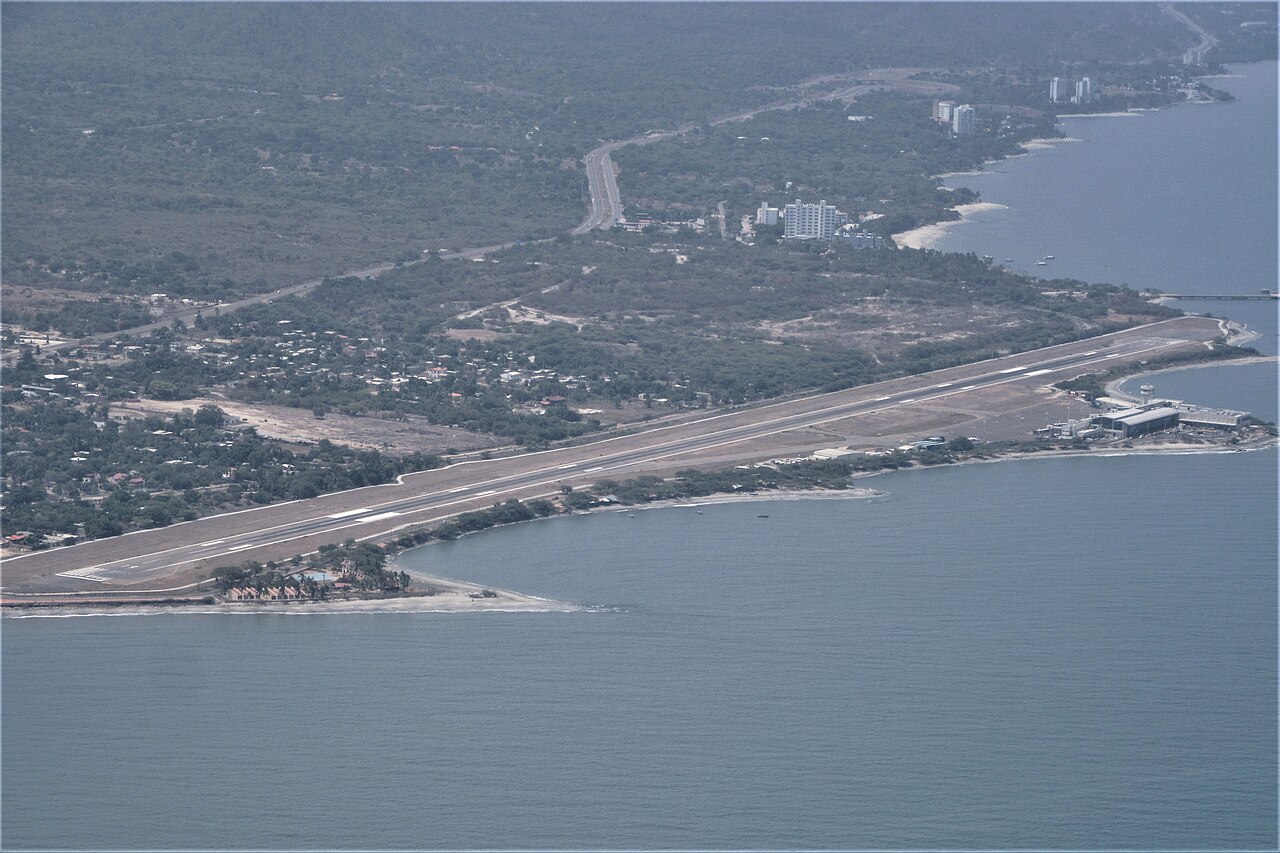 Aerial view of Santa Marta's coastline showing the airport and Caribbean shoreline
