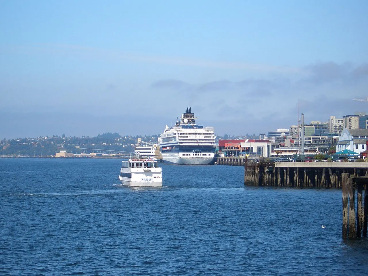 Seattle waterfront with cruise ship docked and Argosy tour boat