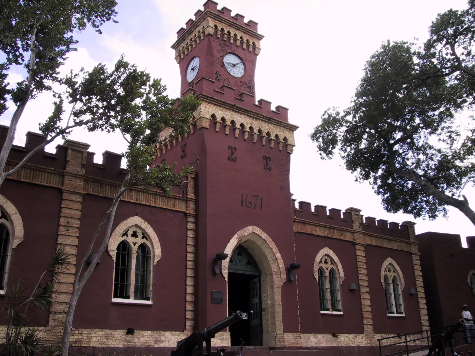 Fort Christian with its distinctive red brick tower against blue sky
