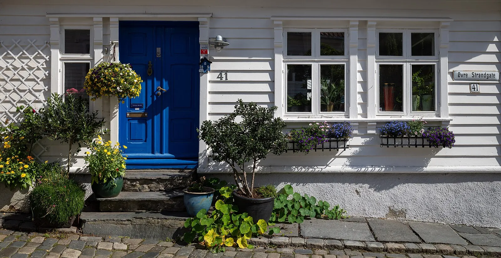 Dramatic view of Preikestolen Pulpit Rock towering above Lysefjord waters