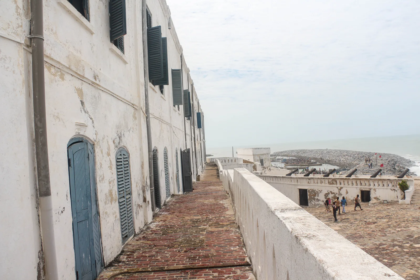 Cape Coast Castle in Ghana's Central Region, its whitewashed walls and courtyard above the sea