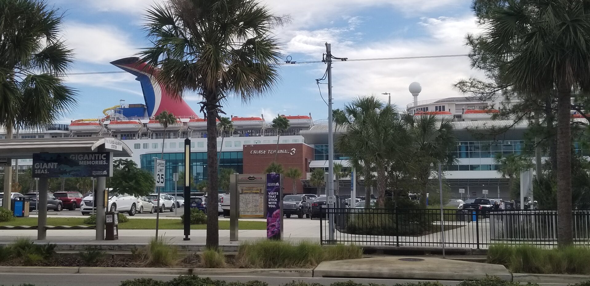 Historic brick streets of Ybor City with wrought-iron balconies, cigar shops, and Spanish-style architecture under Florida sunshine