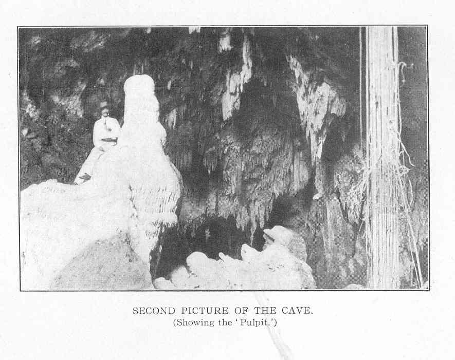 Historical photograph of a cave interior showing 'The Pulpit' stalactite formation