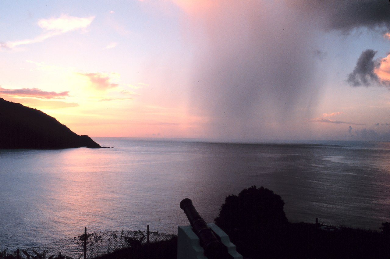 Sunset from coastal fort with cannon overlooking the Caribbean Sea, Trinidad