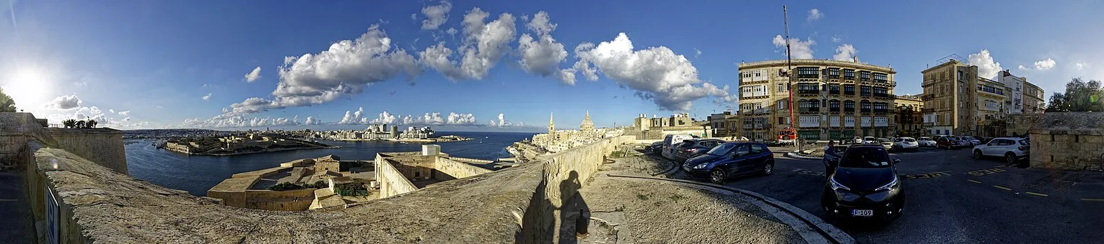Panoramic view from Valletta fortifications showing Marsamxett Harbour and Sliema skyline
