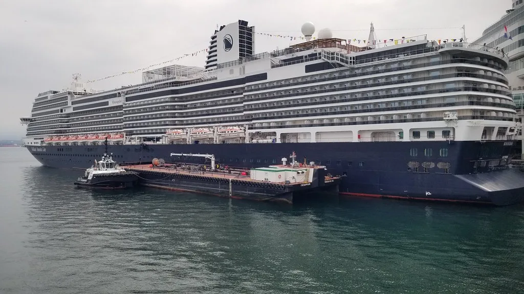 Panoramic view of Vancouver skyline with mountains and harbor at golden hour