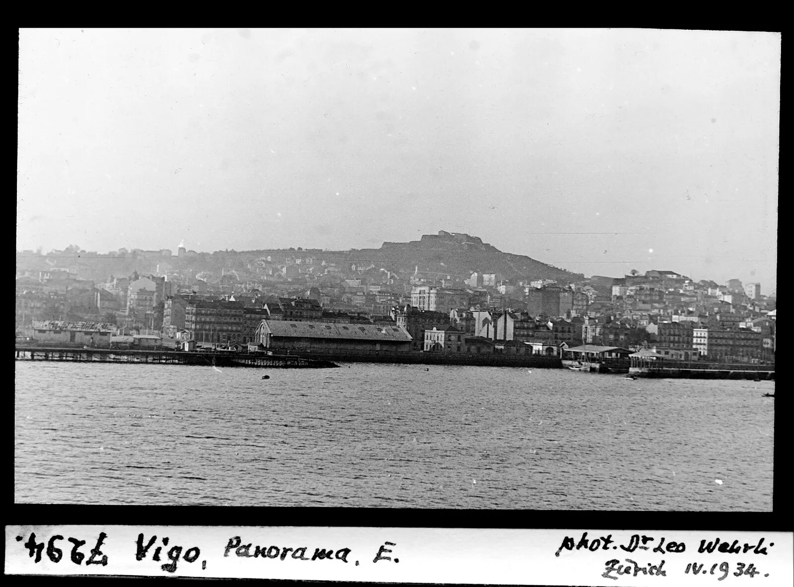 1934 black and white panorama of Vigo harbor from the sea by Dr. Leo Wehrli showing waterfront and Monte del Castro