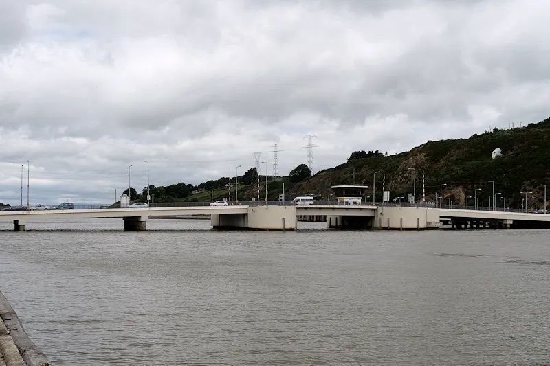 Bridge spanning the River Suir in Waterford with hills in background