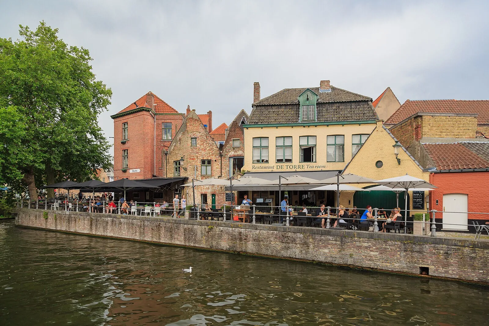 Canalside restaurants in Bruges including Restaurant De Torre tea room