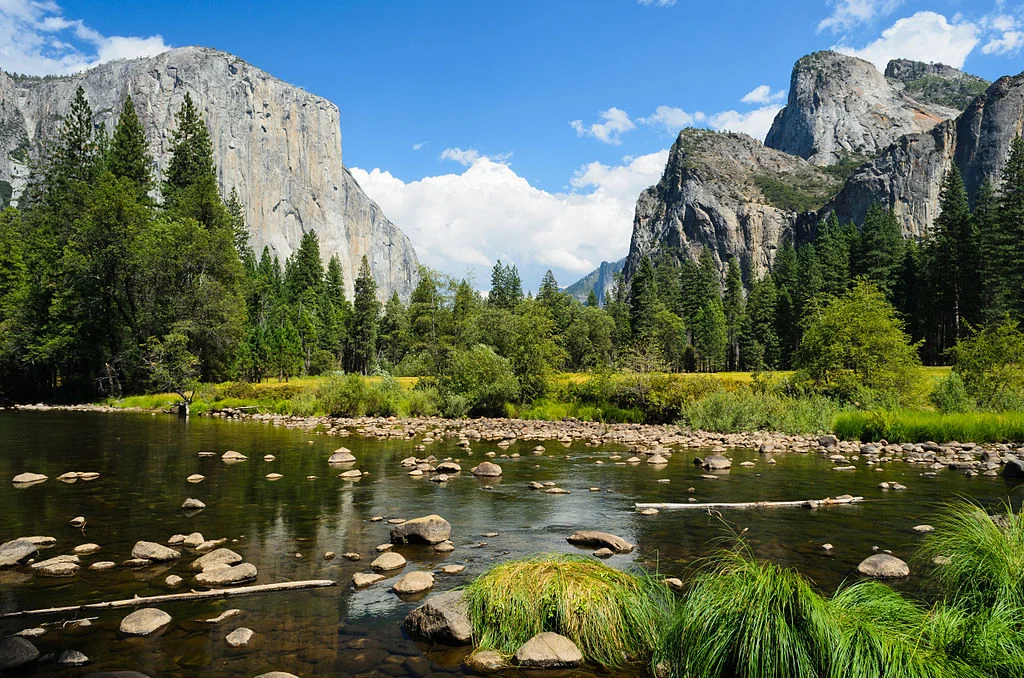 Yosemite’s Valley View at sunset—granite, river, and sky in a grand American scale.